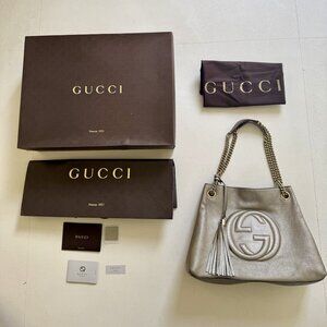 Gucci Metallic Silver Leather Shoulder Bag with Tassel Charm